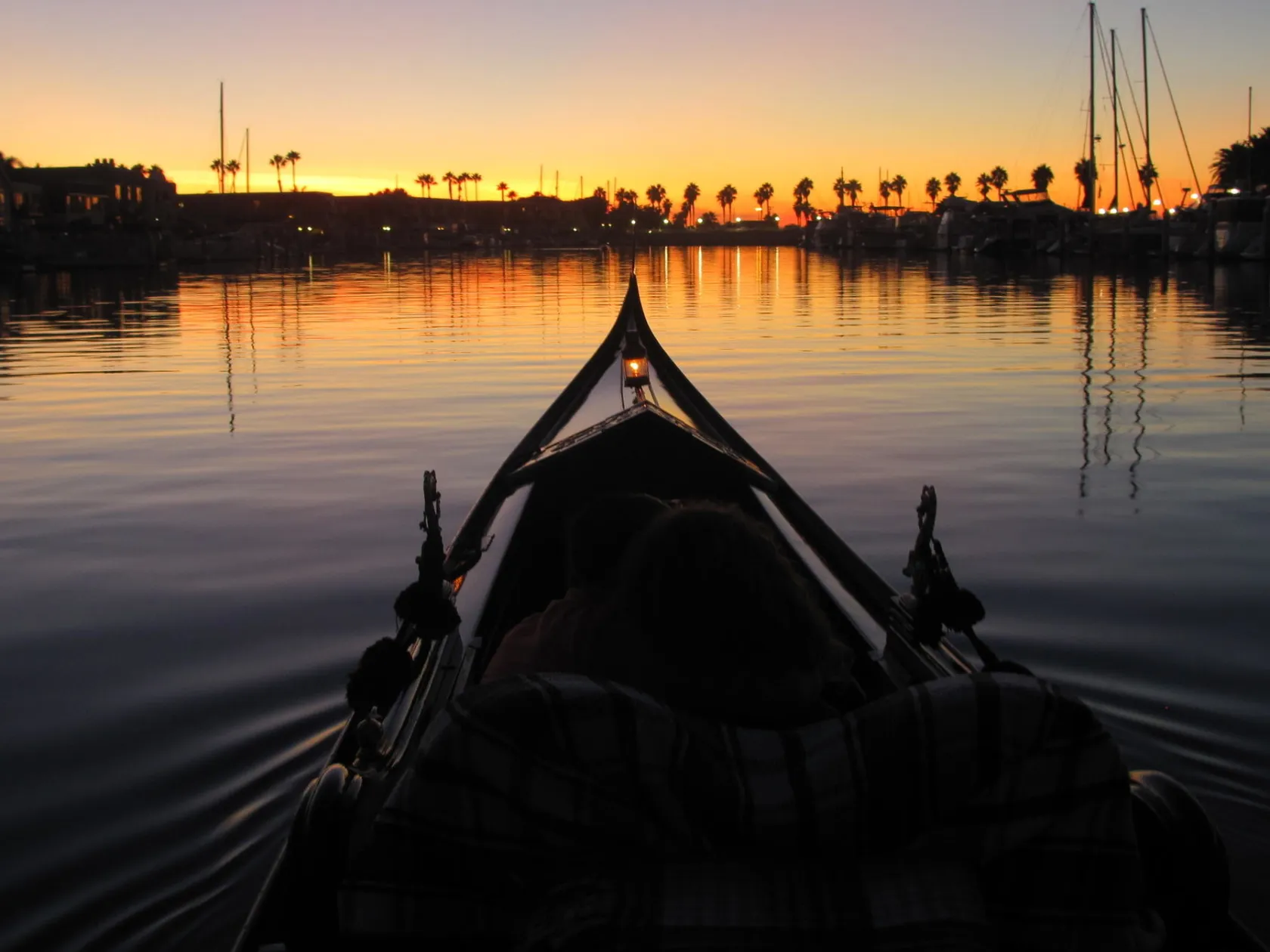 a sunset over a body of water
