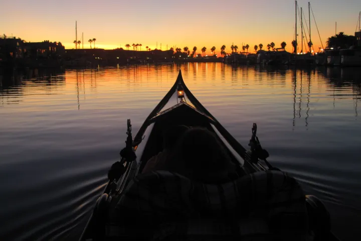 a sunset over a body of water