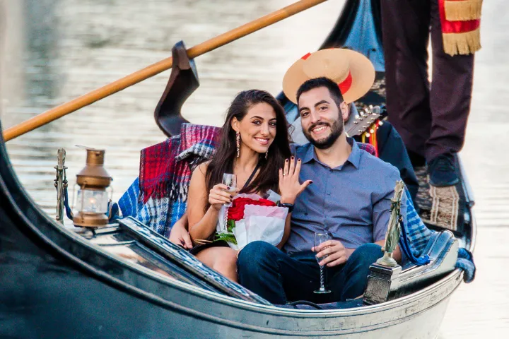 a group of people on a boat in the water