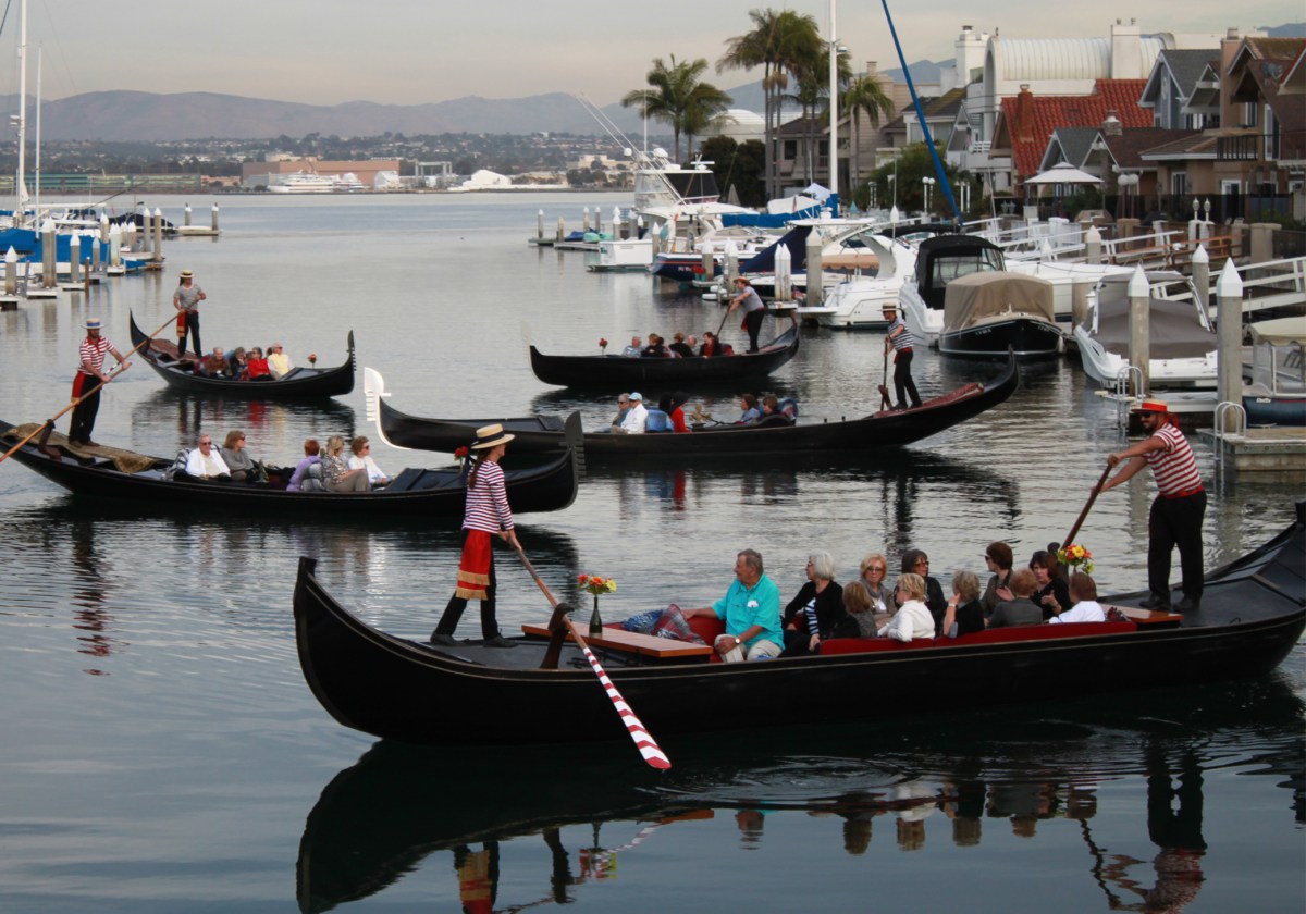 Groups and Fleets a group of people in a small boat in a body of water