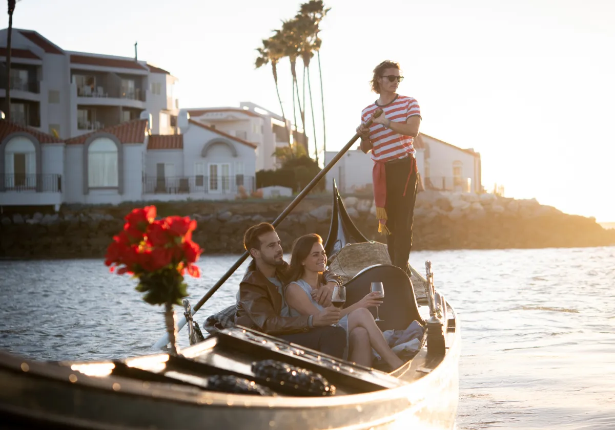 A couple enjoying a romantic cruise on the water