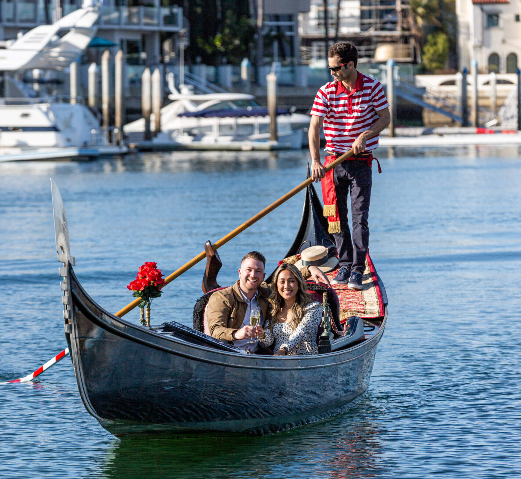 a group of people in a small boat in a body of water
