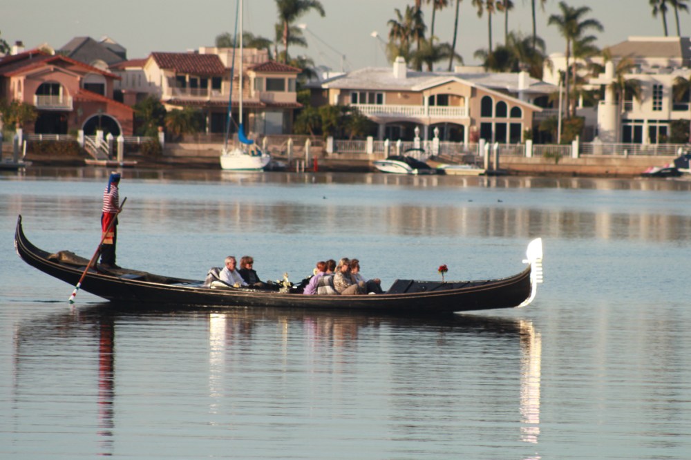a group of six passengers on a team outing gondola ride