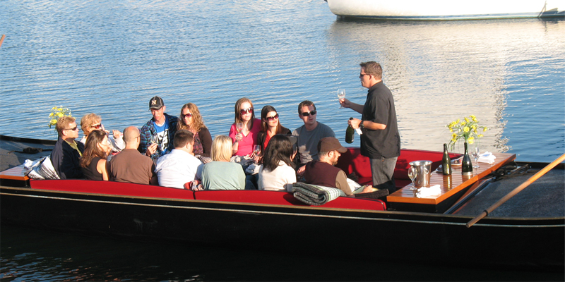 a group of people on a wine tasting gondola