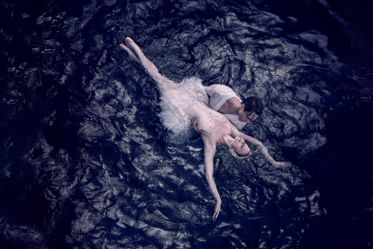 Swan Lake Ballet in the black water
