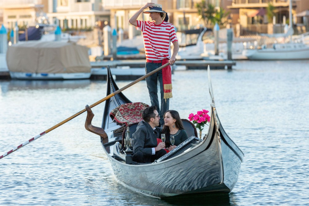 Romantic gondola proposal in Coronado, San Diego with a couple on a private boat ride.