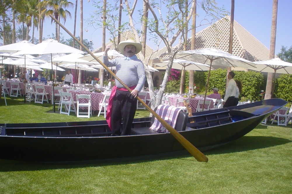 Venetian gondola for rent displayed as a decorative centerpiece on a golf course event in Palm Springs Coachella Valley.