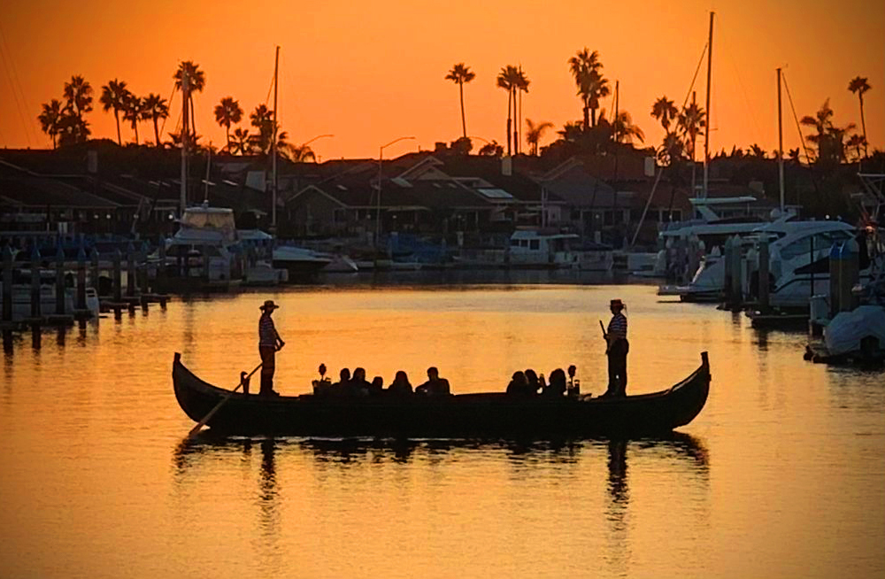 Caorlina style gondola silhouette at sunset in San Diego.