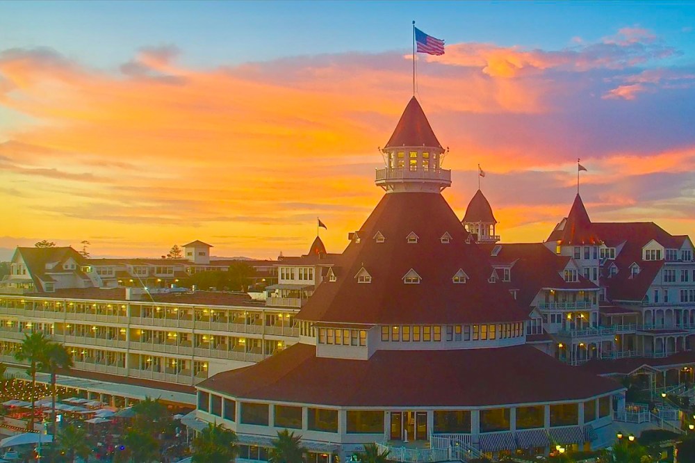 Classic sunset at the Hotel del Coronado with warm light over Coronado Beach