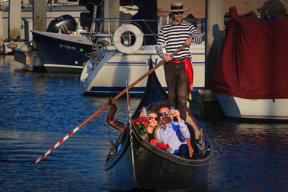 Romantic gondola ride through Coronado Cays canals in San Diego California