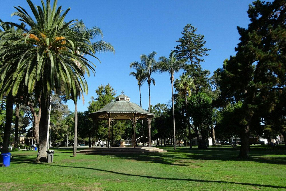 Spreckels Park in Coronado with open green space and mature trees inspired by European gardens