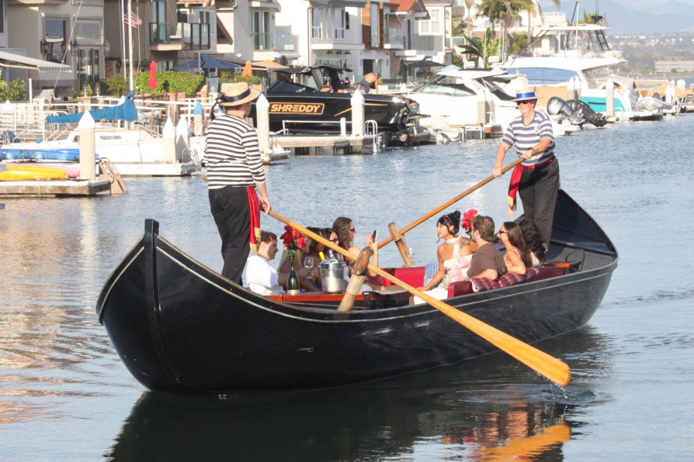 Group of friends celebrating the birthday girl gondola ride in San Diego
